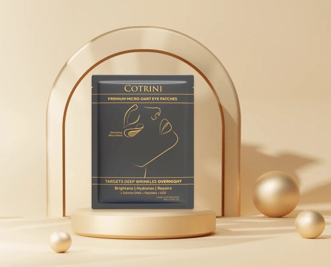 Cotrini Premium Micro‑Dart Eye Patches pouch on a gold podium